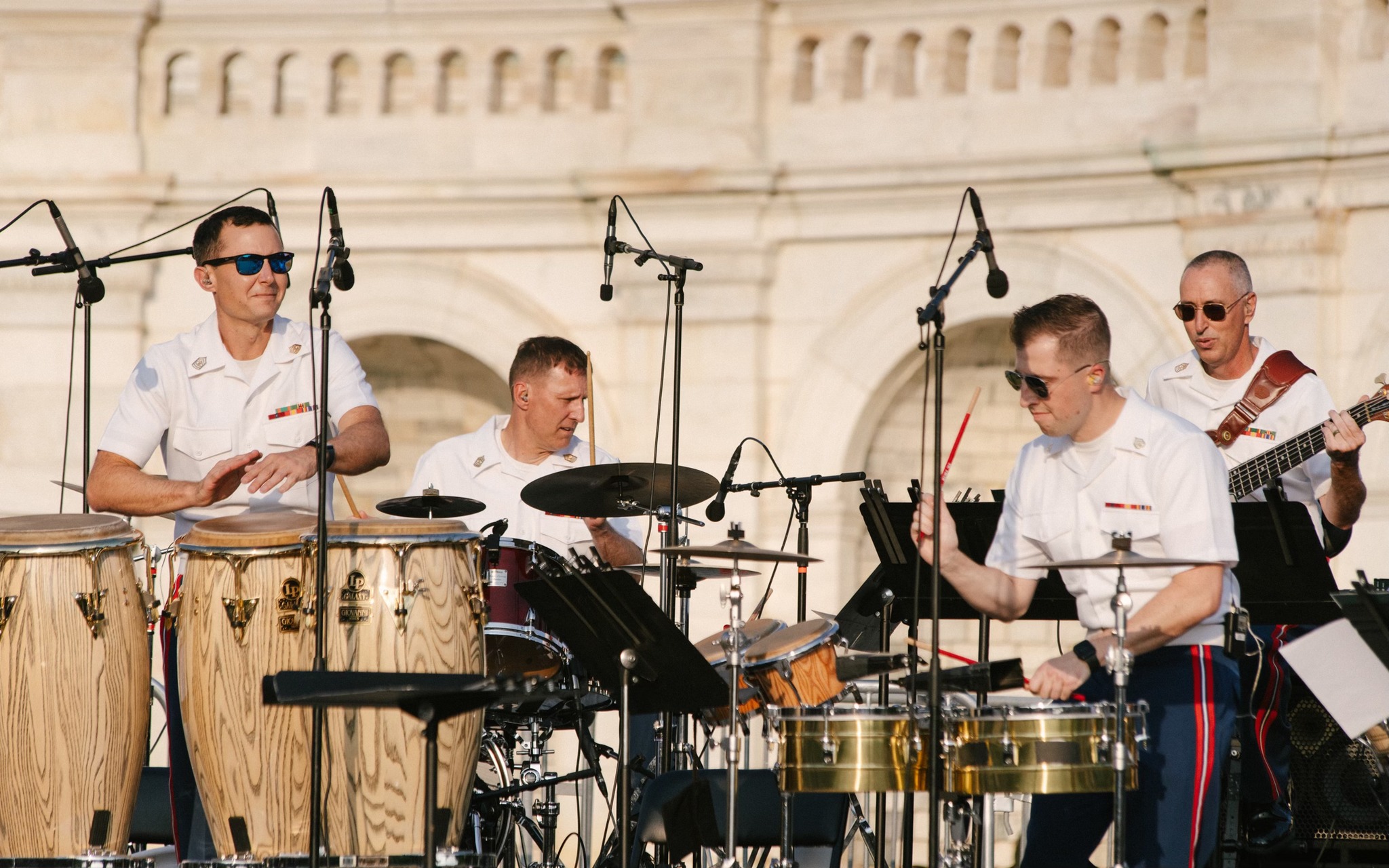Latin Jazz band hold their instruments