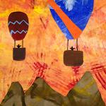 Orange background with two hot air balloons in red and royal blue with mountains below