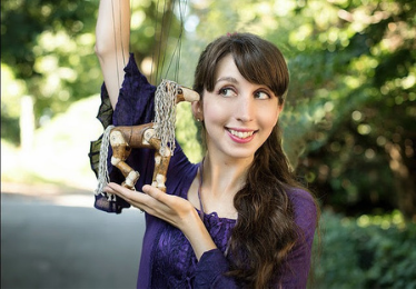 woman with string puppet